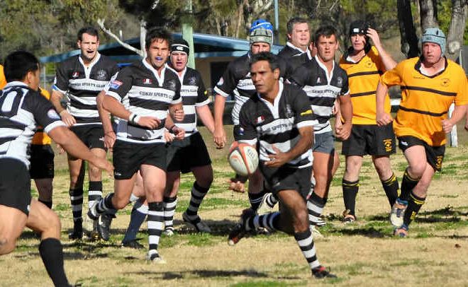 Jeremy Jerome passes the ball to fellow Water Rats player Waitai Petera in the game that saw Warwick take the competition lead.